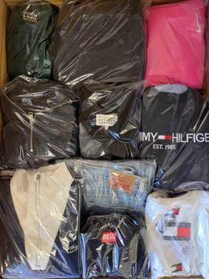 The photo shows a package with clothing in the category C.