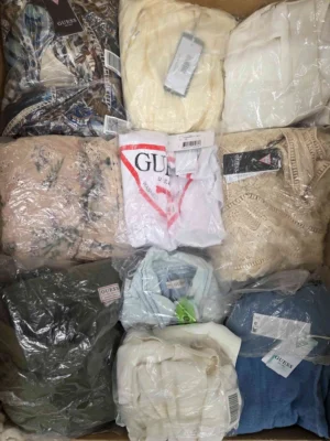 The photo shows a package with clothing in the category B.