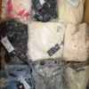 The photo shows a package with clothing in the category B.