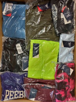 The photo shows a package with clothing in the category R.