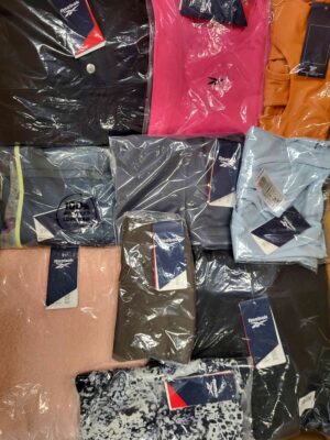 The photo shows a package with clothing in the category R.
