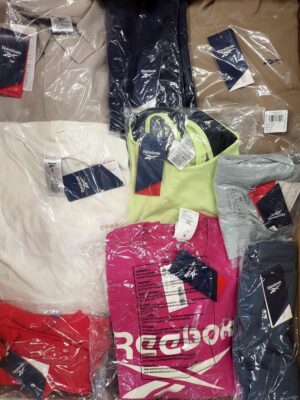 The photo shows a package with clothing in the category R.