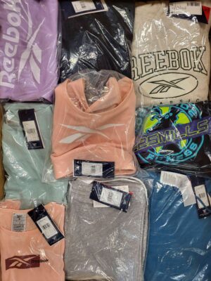 The photo shows a package with clothing in the category R.