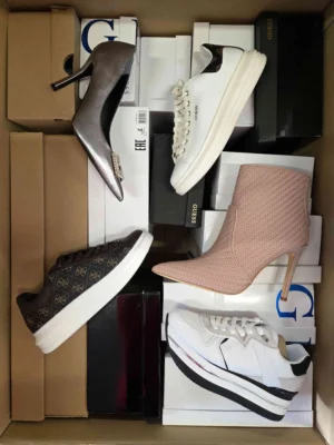 The photo shows a package with footwear in the category BS.