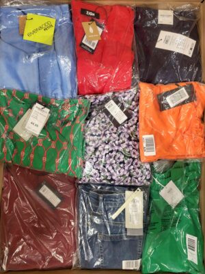 The photo shows a package with clothing in the category AR.