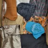 The photo shows a package with clothing in the category TSC.