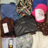 The photo shows a package with clothing in the category TSC.