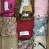 The photo shows a package with clothing in the category TSC.