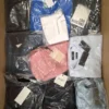 The photo shows a package with clothing in the category AP.