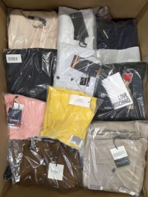 The photo shows a package with clothing in the category AP.