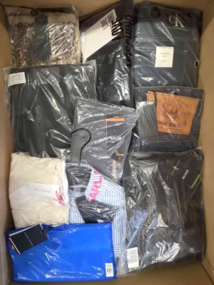 The photo shows a package with clothing in the category AP.