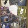 The photo shows a package with clothing in the category AP.