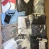 The photo shows a package with clothing in the category AP.