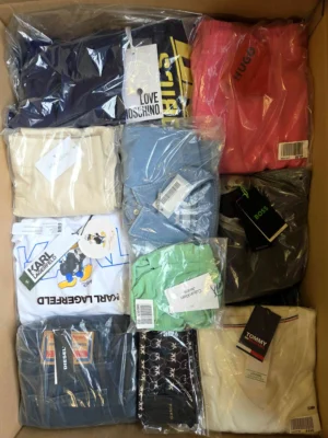 The photo shows a package with clothing in the category AP.