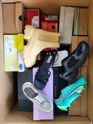 The photo shows a package with footwear in the category AS.