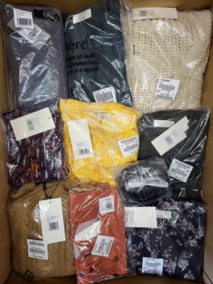 The photo shows a package with clothing in the category YA.
