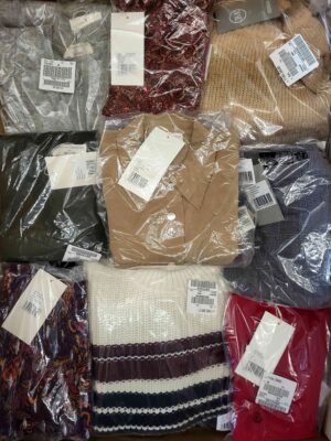 The photo shows a package with clothing in the category YA.