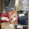 The photo shows a package with clothing in the category YA.