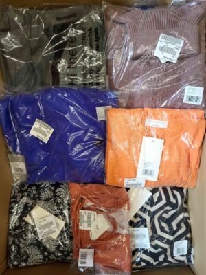 The photo shows a package with clothing in the category YA.