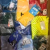 The photo shows a package with clothing in the category H.
