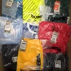 The photo shows a package with clothing in the category H.