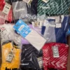 The photo shows a package with clothing in the category H.