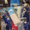 The photo shows a package with clothing in the category H.