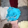 The photo shows a package with clothing in the category BSN.