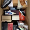 The photo shows a package with footwear in the category AS.