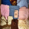 The photo shows a package with clothing in the category BSN.