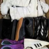 The photo shows a package with footwear in the category CSU.