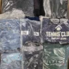The photo shows a package with clothing in the category D.