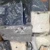 The photo shows a package with clothing in the category D.