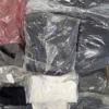 The photo shows a package with clothing in the category D.