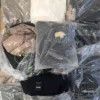 The photo shows a package with clothing in the category D.