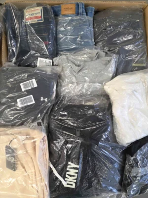 The photo shows a package with clothing in the category D.