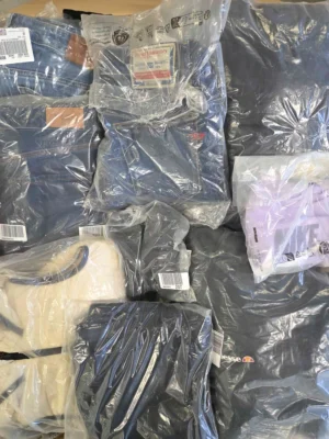 The photo shows a package with clothing in the category D.