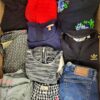 The photo shows a package with clothing in the category U.