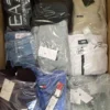 The photo shows a package with clothing in the category B.