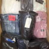 The photo shows a package with clothing in the category B.