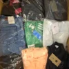 The photo shows a package with clothing in the category B.