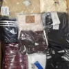 The photo shows a package with clothing in the category B.