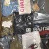 The photo shows a package with clothing in the category B.