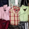 The photo shows a package with clothing in the category U.