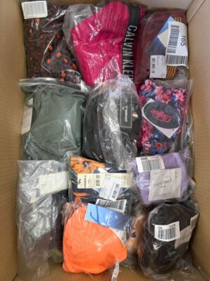 The photo shows a package with clothing in the category ABW.