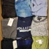 The photo shows a package with clothing in the category U.