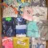 The photo shows a package with clothing in the category N.