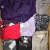 The photo shows a package with clothing in the category U.