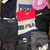 The photo shows a package with clothing in the category U.