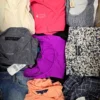 The photo shows a package with clothing in the category U.